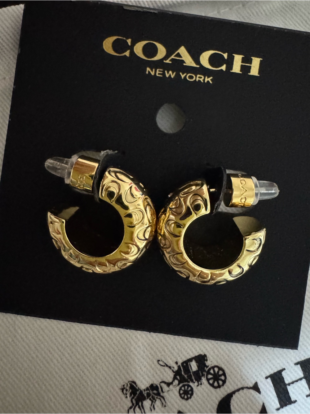 Coach Gold Embossed Hoop Earrings